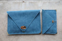 Suede Symmetria Envelopes