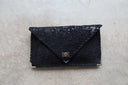 Embossed Symmetria Leather Clutch